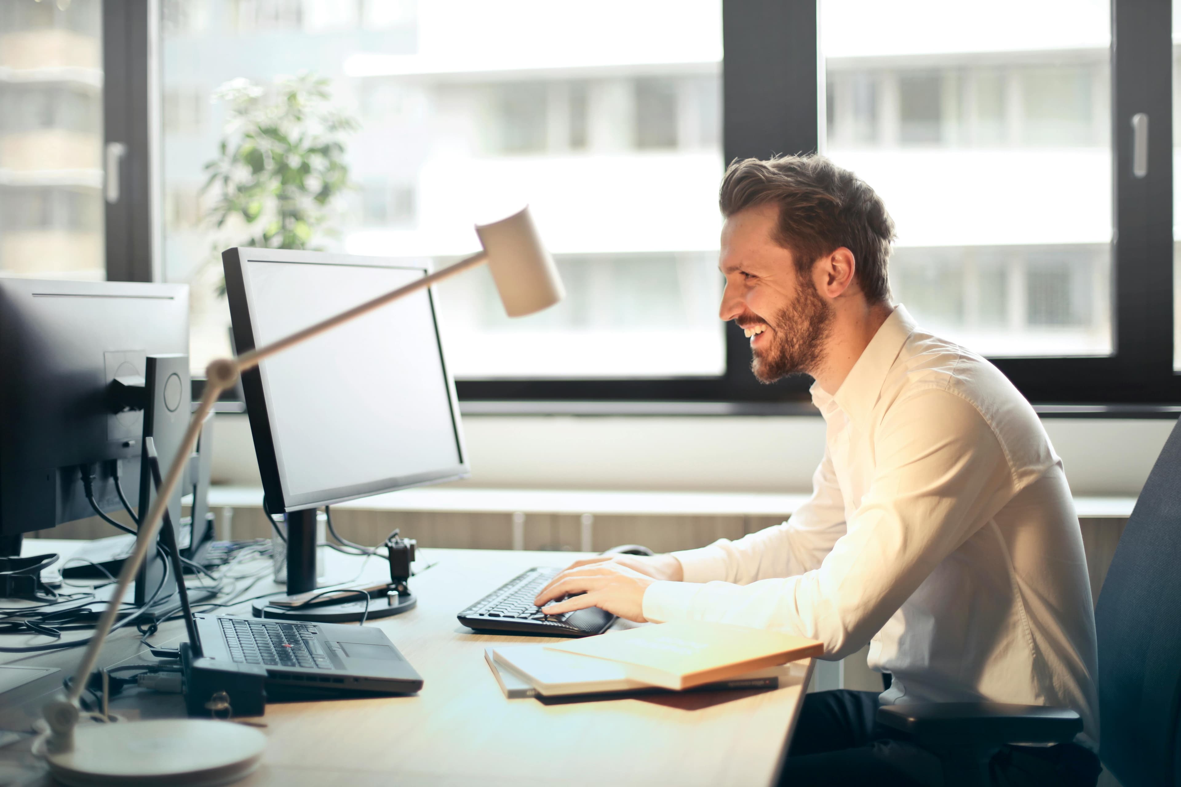 an actuary working at a computer